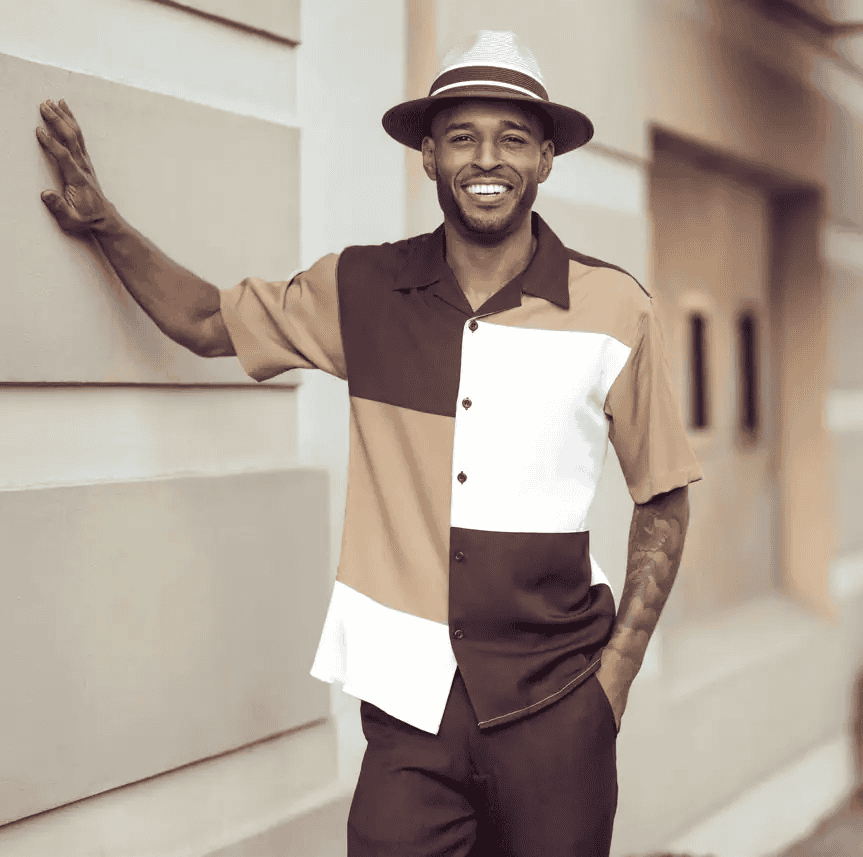 Man wearing a vibrant Montique 2 piece walking suit with matching hat and shoes for a summer event